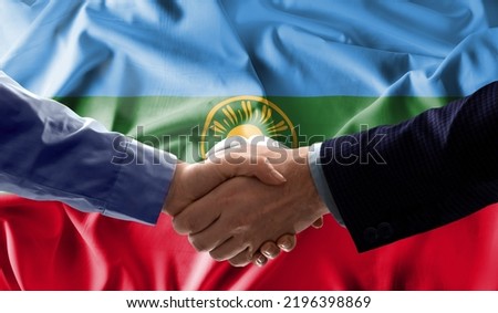 Handshake friendship Karachay Cherkessia flag waving Celebration, Beautifully waving flag Close up of flag.