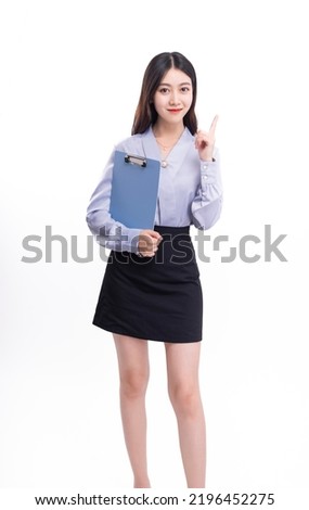 A business woman with a black skirt and a paper on a white background