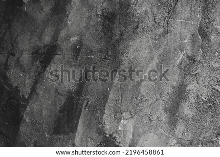 Black stone background, dark grey cement texture with flour. Layout with free text space. Backdrop for cooking food. Top view, flat lay