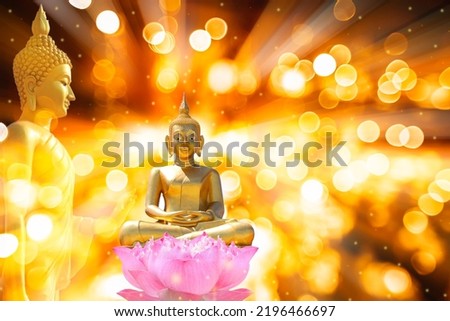 Buddha standing on lotus flower on orange background