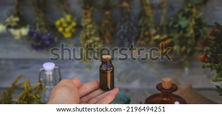 Medicinal herbs and tinctures homeopathy. Selective focus. Nature.