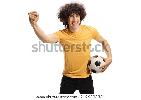 Football fan holding a ball and gesturing with hand isolated on white background