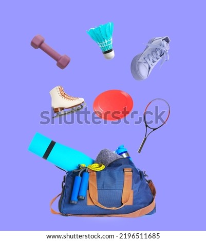 Sports bag and different items on violet background