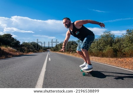 Young man on surf Skate, skater, portrait skater, extreme Sport