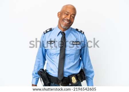 Young police man isolated on white background laughing