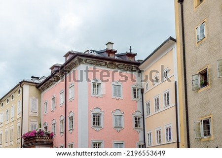Colorful facades of historic buildings in the old town of Salzburg.