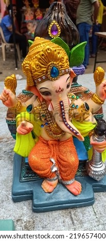Lord Ganesha, the Lord of Obstacles, both of a material and spiritual order.
