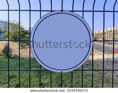 Image of an empty board on a fence