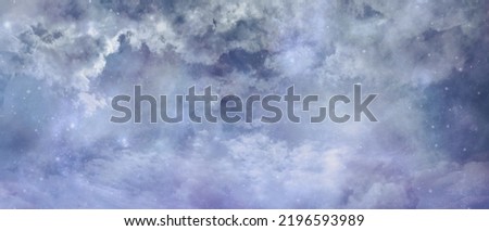 Celestial heavens above concept background banner - beautiful blue light filled heavenly ethereal cloud scape depicting the heavens above 

