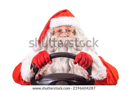 Santa Claus holding a steering wheel, isolated on a white background.