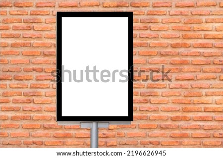 Outdoor pole billboard with mock up white screen on orange brick wall background and clipping path