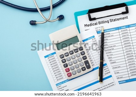 Calculator on medical billing statement with pen on blue background, top view with copy space