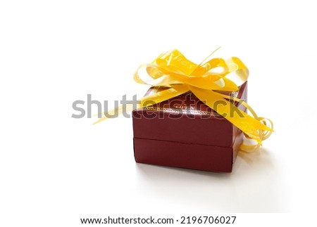 Diwali gift Christmas or New Year gift box or present wrapped in craft paper. Holiday present