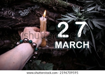 calendar date on the background of an esoteric spiritual ritual. March 27 is the twenty-seventh day of the month.