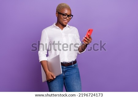 Photo of cute positive short hair woman dressed smart casual outfit spectacles chatting modern gadget isolated violet color background Royalty-Free Stock Photo #2196724173