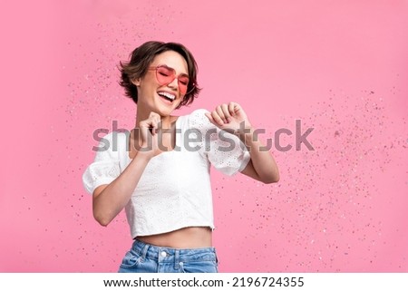 Photo of shiny charming lady wear white blouse heart glasses dancing empty space isolated pink color background Royalty-Free Stock Photo #2196724355