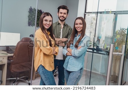 Photo of positive cheerful folded arms three trainee students hr team working in modern young company Royalty-Free Stock Photo #2196724483