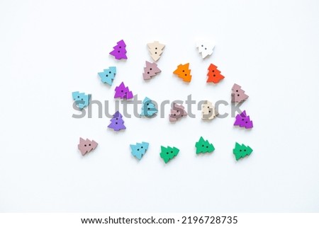 Colored figures in the form of Christmas tree on a white background