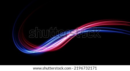 Abstract beautiful light background. Magic sparks on a dark background. Mystical speed stripes, glitter effect. Shine of cosmic rays. Neon lines of speed and fast wind. Glow effect, powerful energy.  Royalty-Free Stock Photo #2196732171