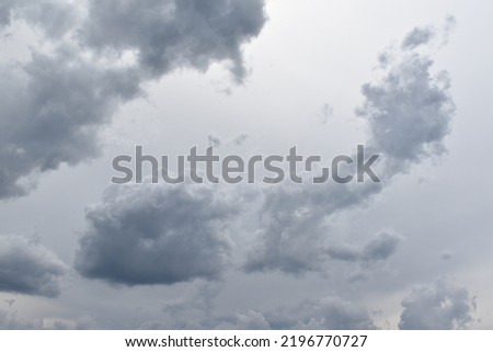 White sky with several clouds