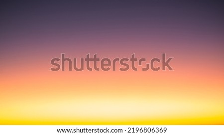 Beautiful bright cloud sky with light for heaven religion background. Sunrise and twilight or sunset cloudscape is orange and blue colours in summer nature.