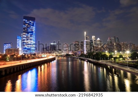 Philadelphia skyline at night reflected on Schuylkill River , Pennsylvania, USA