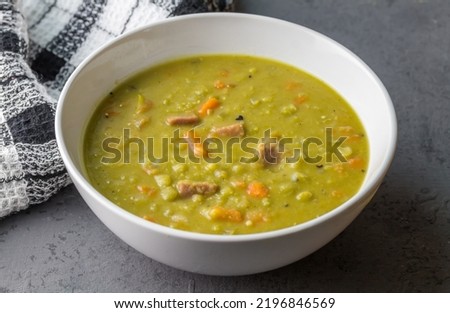 Pea and ham soup on grey counter - photo Royalty-Free Stock Photo #2196846569