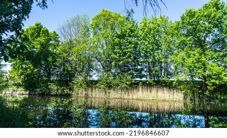 Elde river near the sluice in Barkow in Mecklenburg Royalty-Free Stock Photo #2196846607