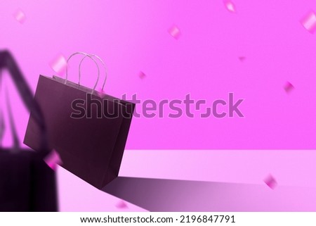 Shopping bag with a colored background. Cyber Monday concept