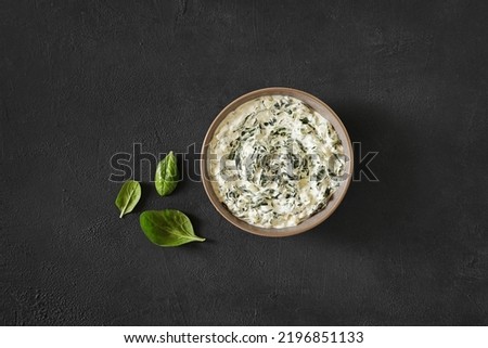 Homemade Spinach dip served in the bowl, top view Royalty-Free Stock Photo #2196851133