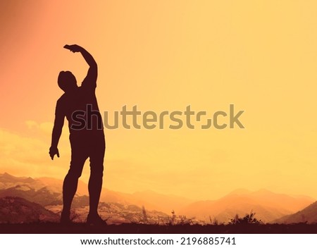 Man Silhouette Take a Selfie on the cliff with blue cloudy sky on Caucasian mountains. Traveler male wear sporty clothes and take pictures with a smartphone on top of rock. summertime season. Jermuk.