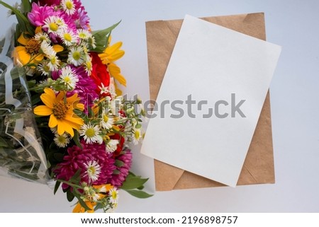 card mockup with bouquet with vivid autunm flowers. flowers background