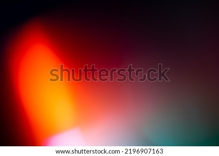 prism light leak texture for photo overlay and effect. lens flare in abstract background. bokeh effect with glow and magical lights on black background. Royalty-Free Stock Photo #2196907163