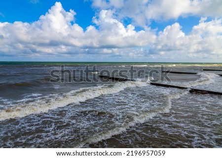 Sea landscape. Surfline with waves and foam at storm time. Nature background