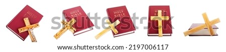Set of Bible with wooden cross isolated on white background