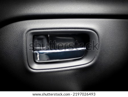 Inner door handle, modern black car