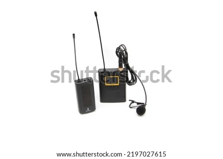 UHF Wireless, rechargeable lavalier microphone system with one transmitter and one receiver, isolated on white background. Ideal for vloggers.