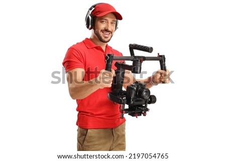 Man using a camera gimbal stabilizer isolated on white background Royalty-Free Stock Photo #2197054765