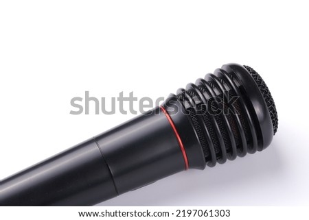 Black microphone isolated on white background close up