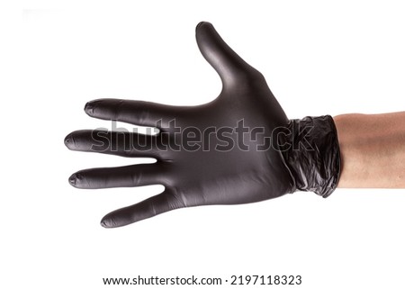 Hand in black rubber glove isolated on white background. Outstretched hand for handshake, closeup