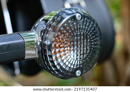 Right turn signal of a motorbike.