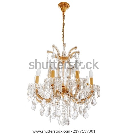Gold tone chandelier on a white background. Chandelier for apartment decor Royalty-Free Stock Photo #2197139301