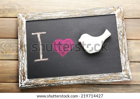I love bird written on chalkboard, close-up