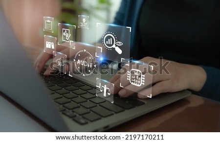 Using artificial intelligence technology in internal audit concept. Examination and evaluation of the financial statements of an organization; income statement, balance sheet, cash flow statement.  Royalty-Free Stock Photo #2197170211