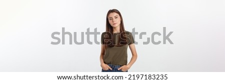 Close-up portrait of yong woman casual portrait in positive view, big smile, beautiful model posing in studio over white background. Royalty-Free Stock Photo #2197183235