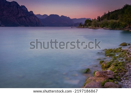 Idyllic Lake Garda in Malcesine at dawn, Italian alps, long exposure