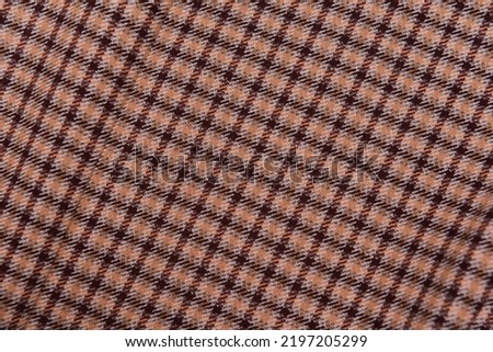 Brown textile background with stripes of
 Colorful woven fabric texture
