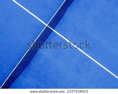 drone aerial view of a blue paddle tennis court, racket sports courts Royalty-Free Stock Photo #2197258423
