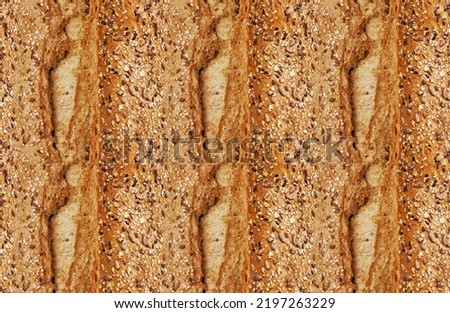 Pattern texture repeating seamless. Homemade fresh crunchy sourdough bread. Background. Сlose up view from top. Proper nutrition. Texture of baked crust of healthy whole wheat bread. Bakery.