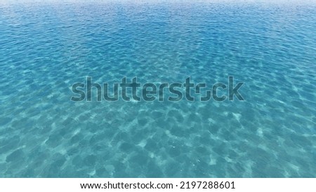 Abstract blue water background with sunbeams.